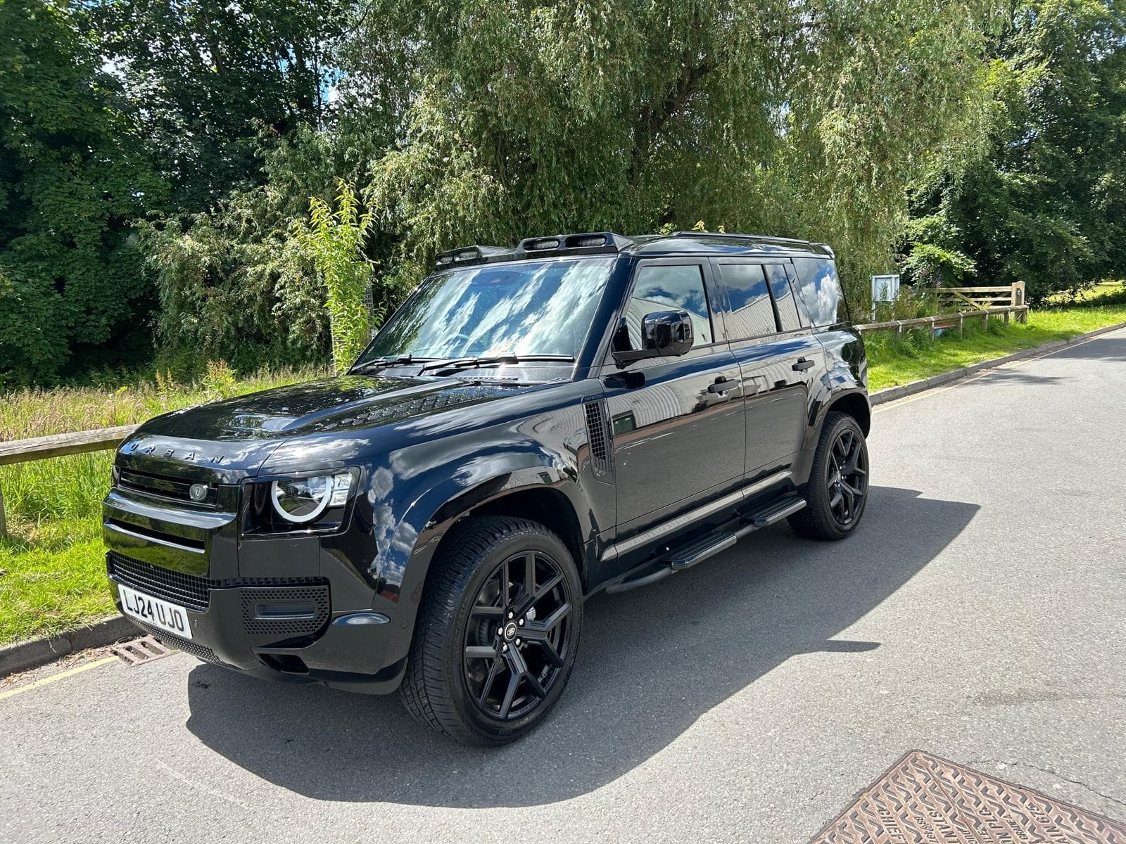 Black Land Rover Defender after mobile valet