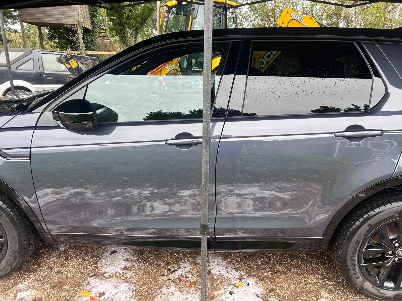 Range Rover Evoque under mobile valet canopy