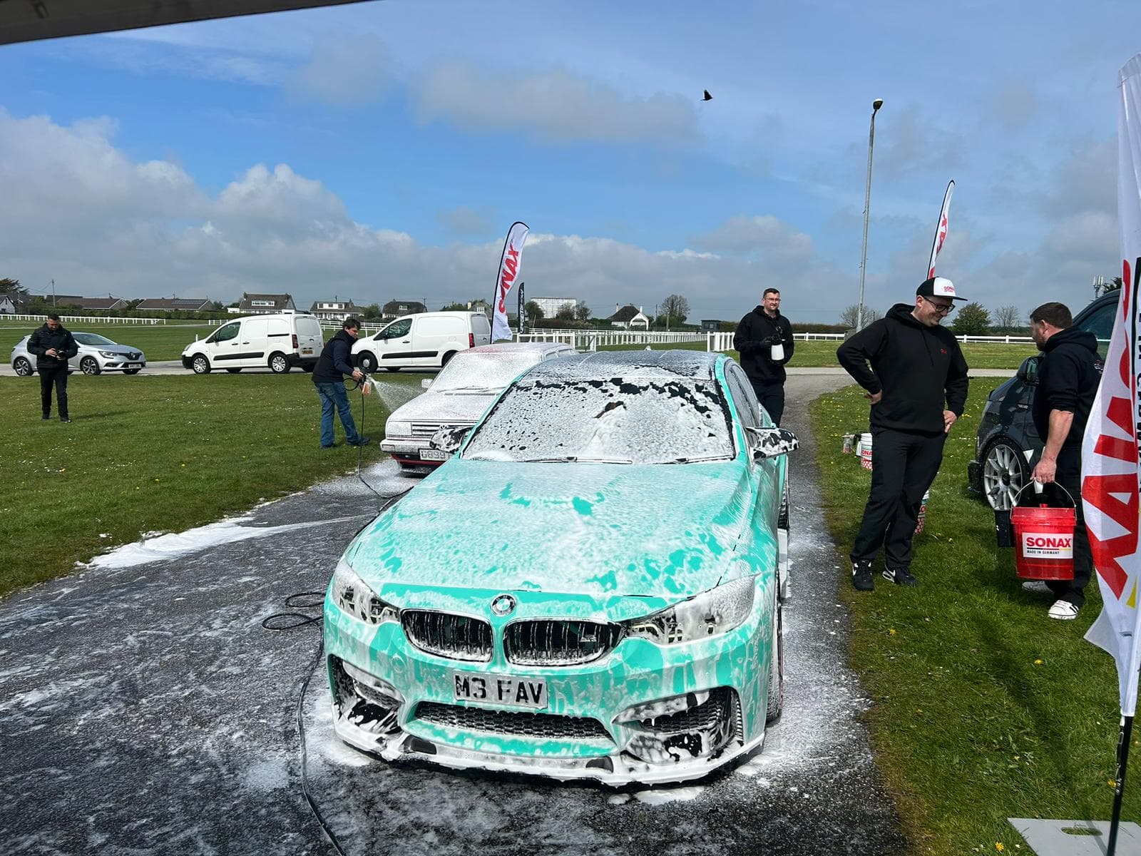 BMW M3 foam wash in action at car show
